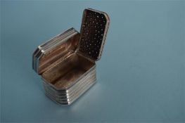A good quality William IV nutmeg grater with ribbed decoration, hinged top and canted corners.