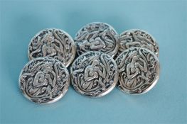 A set of six stylish buttons decorated with ladies. Chester. By T&S. Est. £30 - £40.