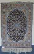 A modern Indian rug with star medallion and blue background. Approx. 160 cms x 106 cms. Est. £