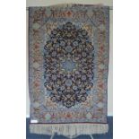 A modern Indian rug with star medallion and blue background. Approx. 160 cms x 106 cms. Est. £