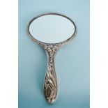 A stylish Art Nouveau hand mirror. Chester. By J&R. Est. £40 - £50.