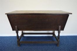 An unusual oak tapered box on stand of graduating form and hinged top. Est. £80 - £100.