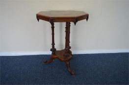 A good burr walnut occasional table on reeded columns and string inlay. Est. £40 - £50.