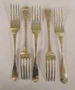 A set of five OE dessert forks. London 1819. By WC. Approx. 190 grams. Est. £60 - £80.