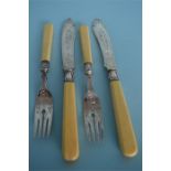 An attractive set of six plus six fish eaters with engraved blades and bone handles. Birmingham