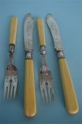 An attractive set of six plus six fish eaters with engraved blades and bone handles. Birmingham