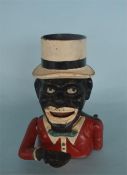 A cast iron "Jolly Negro" mechanical bank with hat. Est. £20 - £30.