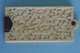 An unusual carved ivory aide memoire. Est. £150 - £200.