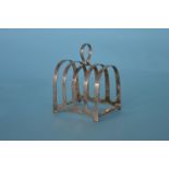 Four division arched top toast rack. Sheffield. By R. & D. Est. £30 - £40