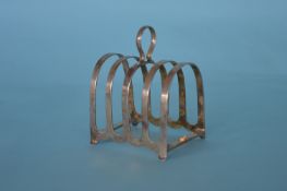 Four division arched top toast rack. Sheffield. By R. & D. Est. £30 - £40