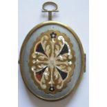 An oval brass mounted miniature. Est. £30 - £40.