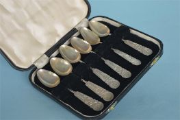 A case set of six Chinese teaspoons. Approx. 42 grams. Est. £20 - £30