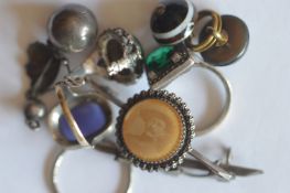 A group of various silver rings, brooches etc. Est. £20 - £30.