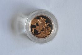 A proof 2009 Royal Mint sovereign. Est. £200 - £250.