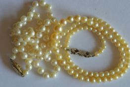 Two graduated strings of pearl beads. Est. £20 - £30.