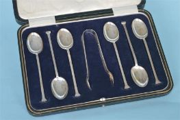 A heavy set of six nail top teaspoons and matching tongs in fitted box. Sheffield. By CB&S.