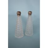 A pair of tapered hob-nail cut bottles with swirl tops. Birmingham. By J.G. & S. Est. £50 - £60