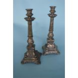 A pair of unusual Continental candlesticks decorated with flowers and scrolls. Marked to base PB&