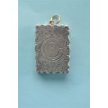 A heavy rectangular scroll engraved vinaigrette decorated with flowers and leaves, with loop top.