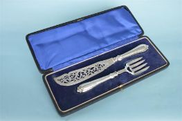 A boxed pair of good quality fish servers with bright cut decoration. Birmingham 1859. By John