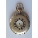 A silver half Hunter pocket watch with white enamel dial. Est. £40 - £50.