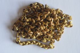 An Antique pinch back guard chain with ball decoration. Est. £150 - £200.