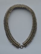 A large heavy plated collar with ball decoration.