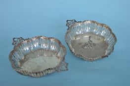A pair of pierced decorated bonbon dishes with rib