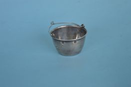 An unusual Russian bucket shaped strainer with pie