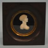 A small rectangular carved hardstone miniature of