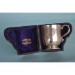 A good quality boxed Christening mug with gilt int