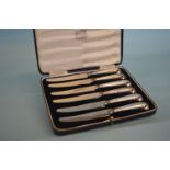 A cased set of six silver mounted tea knives. Shef