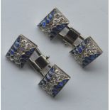A good pair of French cufflinks mounted with diamonds and stylish cabochon sapphires. Est. £