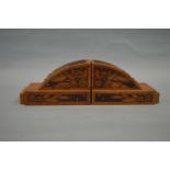 A good pair of satinwood bookends decorated with f