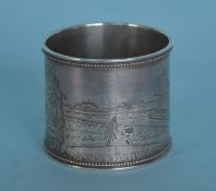 A good Russian napkin ring engraved with a slay an