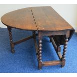 An Eighteenth Century oak gate-leg dining table ha