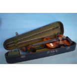 A cased violin together with two bows. Est. £150 -