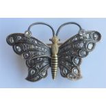 A good rose diamond and gold brooch in the form of a butterfly with outstretched wings and fitted