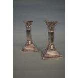 A pair of good quality Corinthian column candlesti