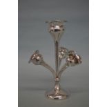 An attractive four trumpet epergne with wavy edges