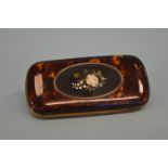 A good tortoiseshell and pietra dura wallet with hinged sides. Est. £250 - £300.