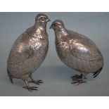 A good pair of matched silver partridges in standi