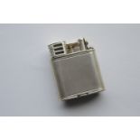 A good Dunhill petrol lighter with engine turned b