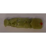 An unusual carved Jade belt hook decorated with dr