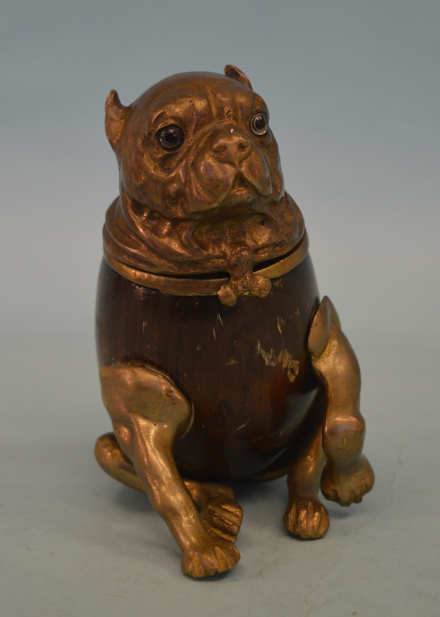 A good brass mounted inkwell in the form of a dog