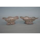 A pair of good quality pierced bonbon dishes decor