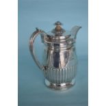 George III lidded beer jug of half fluted design,