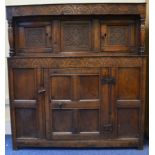 An Eighteenth Century Oak court cupboard having ca