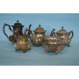 A good Continental five piece tea service decorated with swags and scrolls. 800 standard. Approx.