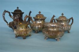 A good Continental five piece tea service decorated with swags and scrolls. 800 standard. Approx.
